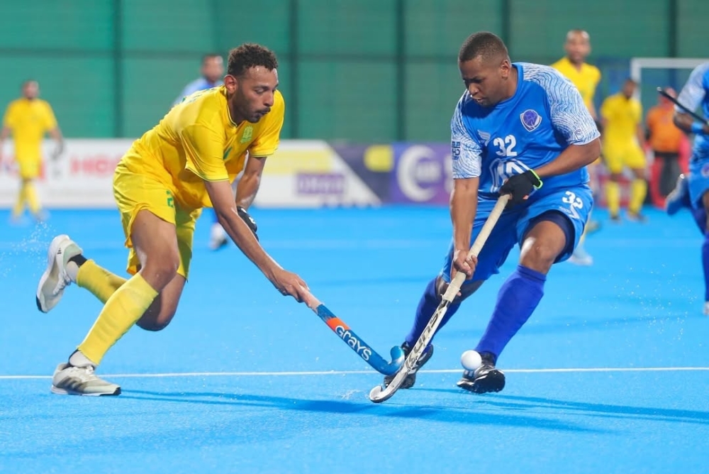 Al Amerat and Seeb players in action.