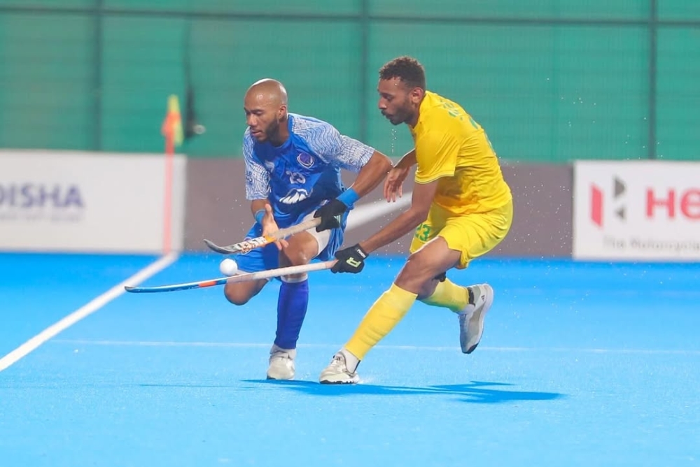 Al Amerat and Seeb players in action.