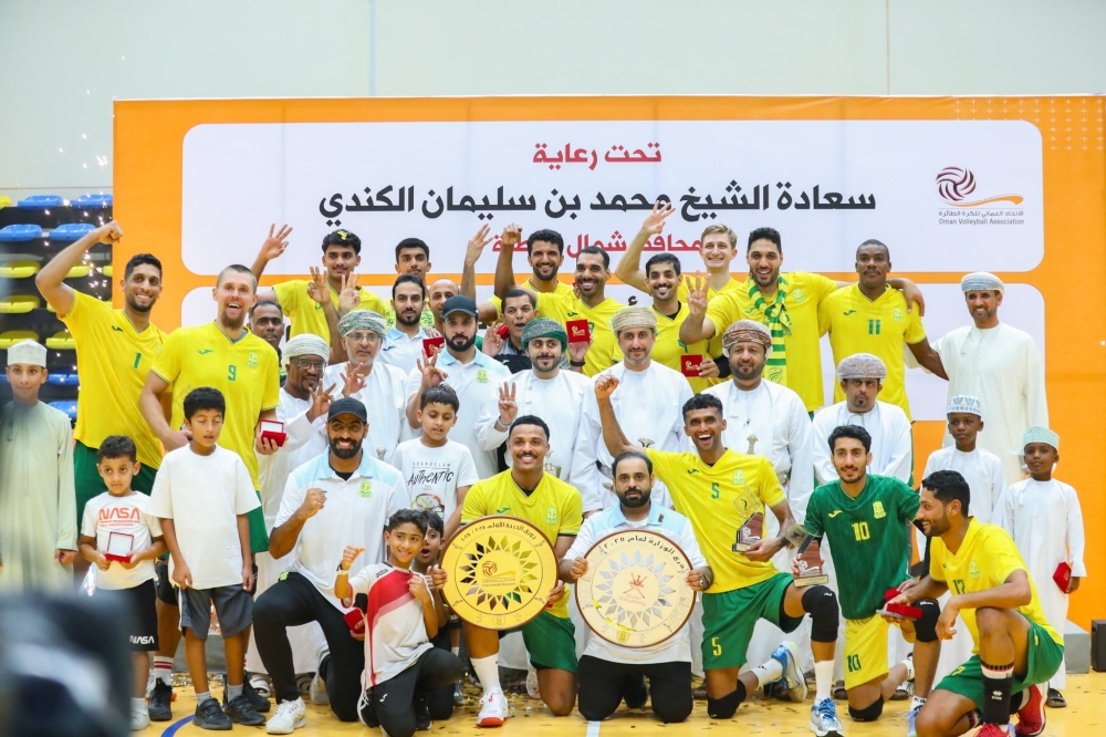 Seeb players celebrate with the OVL shield.