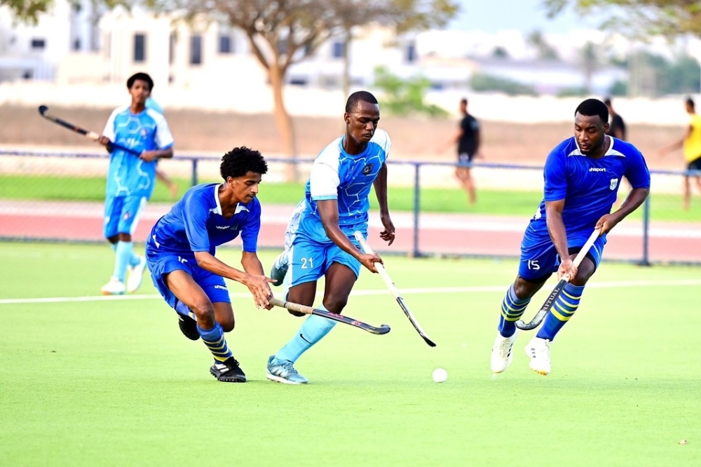 Salalah and Al Nasr players fight for the ball during the Oman Hockey League match.