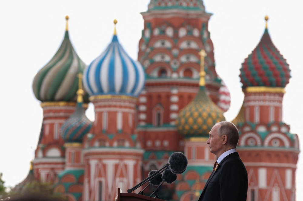 In this pool photograph distributed by the Russian state agency Sputnik, Russia's President Vladimir Putin gives a speech during the Victory Day military parade at Red Square in central Moscow on May 9, 2025. Russia celebrates the 80th anniversary of the Soviet Union's victory over Nazi Germany in World War Two (WWII). (Photo by Vyacheslav PROKOFYEV / POOL / AFP)
