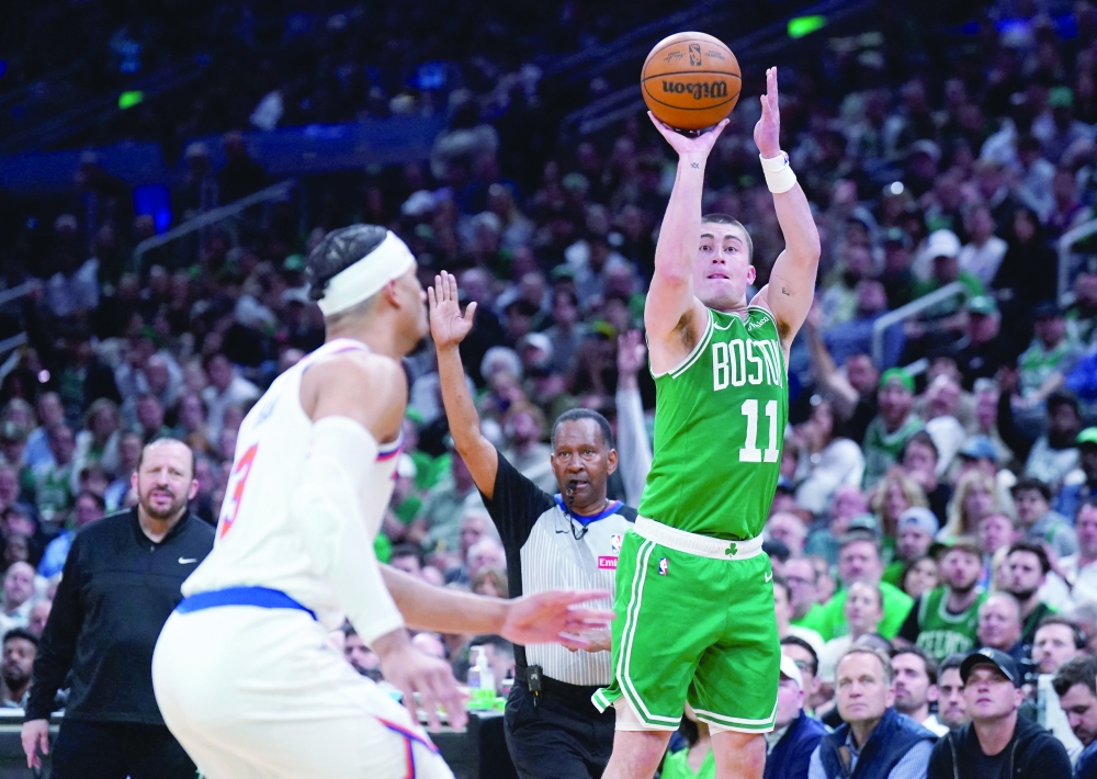 Boston Celtics guard Payton Pritchard (11) shoots for three points against the New York Knicks in the second half during game two of the second round for the 2025 NBA Playoffs at TD Garden. — Reuters