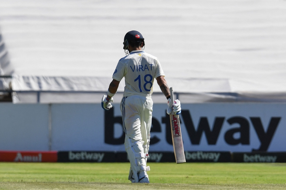 Virat Kohli walks back to the pavilion
