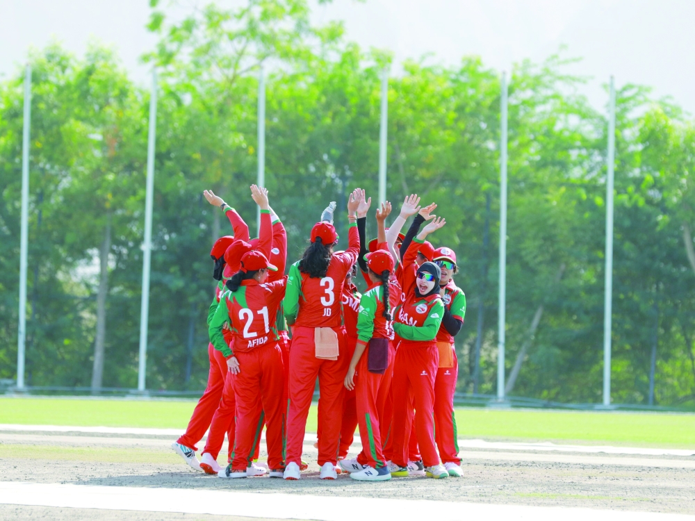 Oman players celebrate a win against Bahrain during the recent T20I series.
