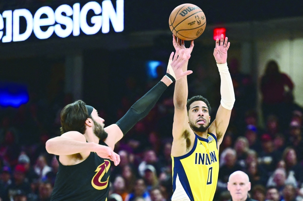 Indiana Pacers guard Tyrese Haliburton (0) shoots over the defense of  Cleveland Cavaliers guard Max Strus (1) during the second half of game five of the second round for the 2025 NBA Playoffs at Rocket Arena. — Reuters