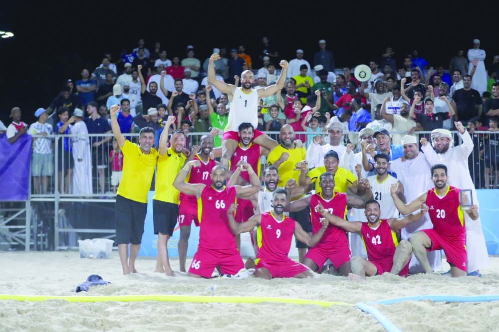Oman players celebrate their win against Jordan in the semifinal.
