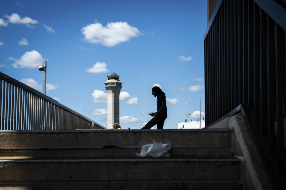 The control tower at Newark Liberty International Airport in Newark, N.J., May 7, 2025. (Graham Dickie/The New York Times)