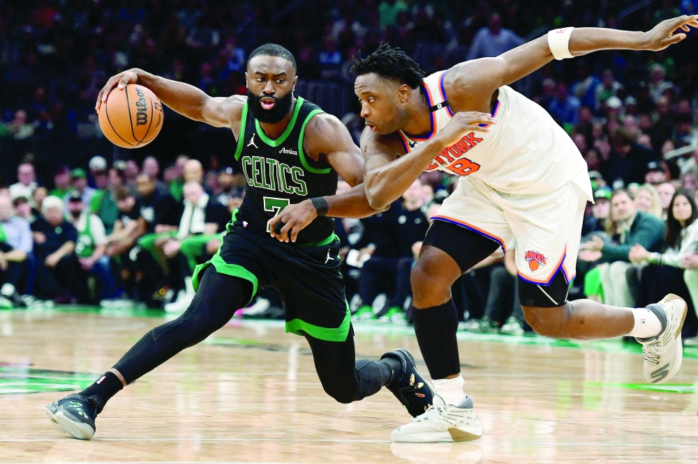 Boston Celtics guard Jaylen Brown (7) controls the ball from New York Knicks forward OG Anunoby (8) in the second half during game five of the second round for the 2025 NBA Playoffs at TD Garden. — Reuters