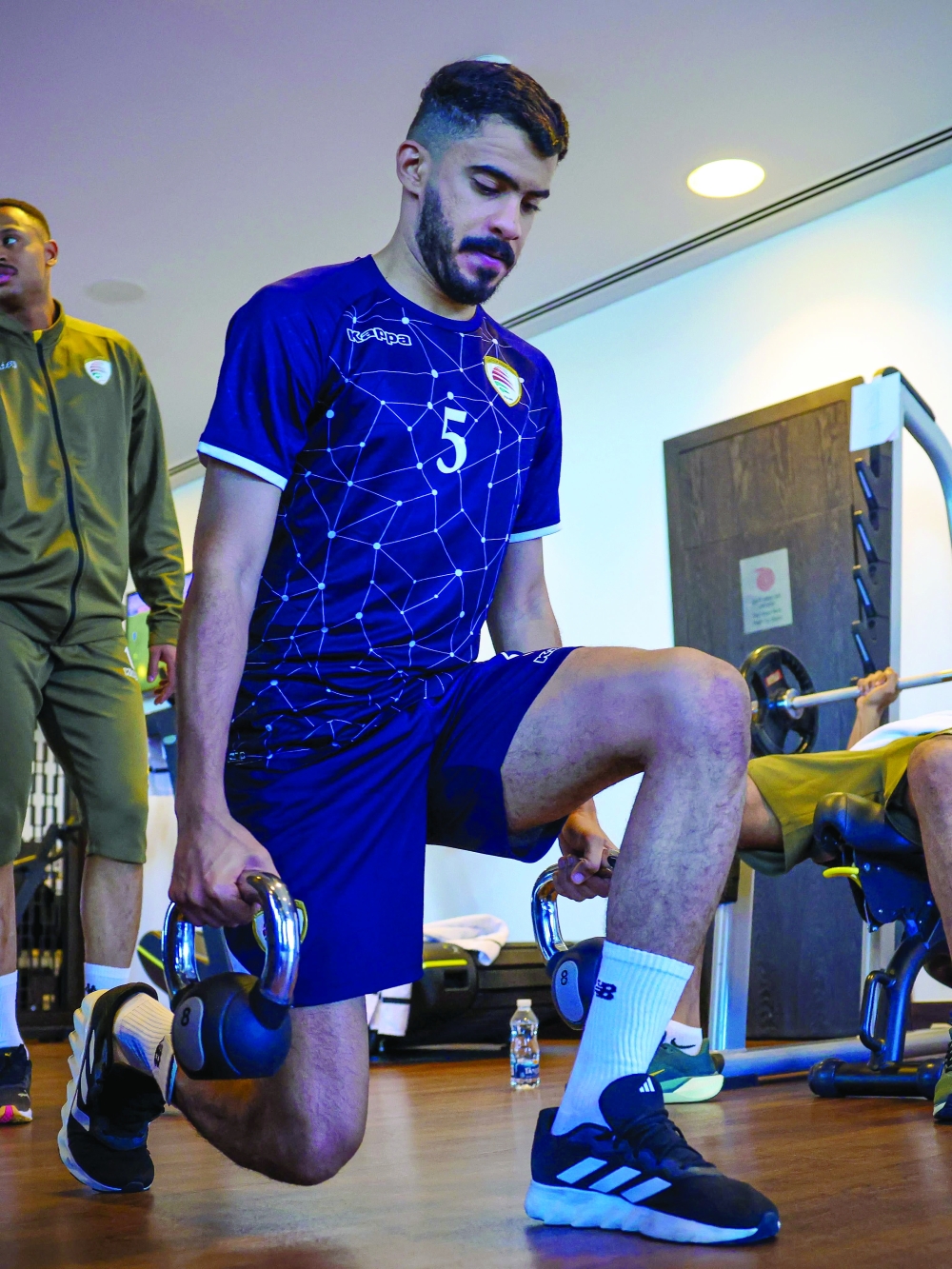 The players work out in the gymnasium.