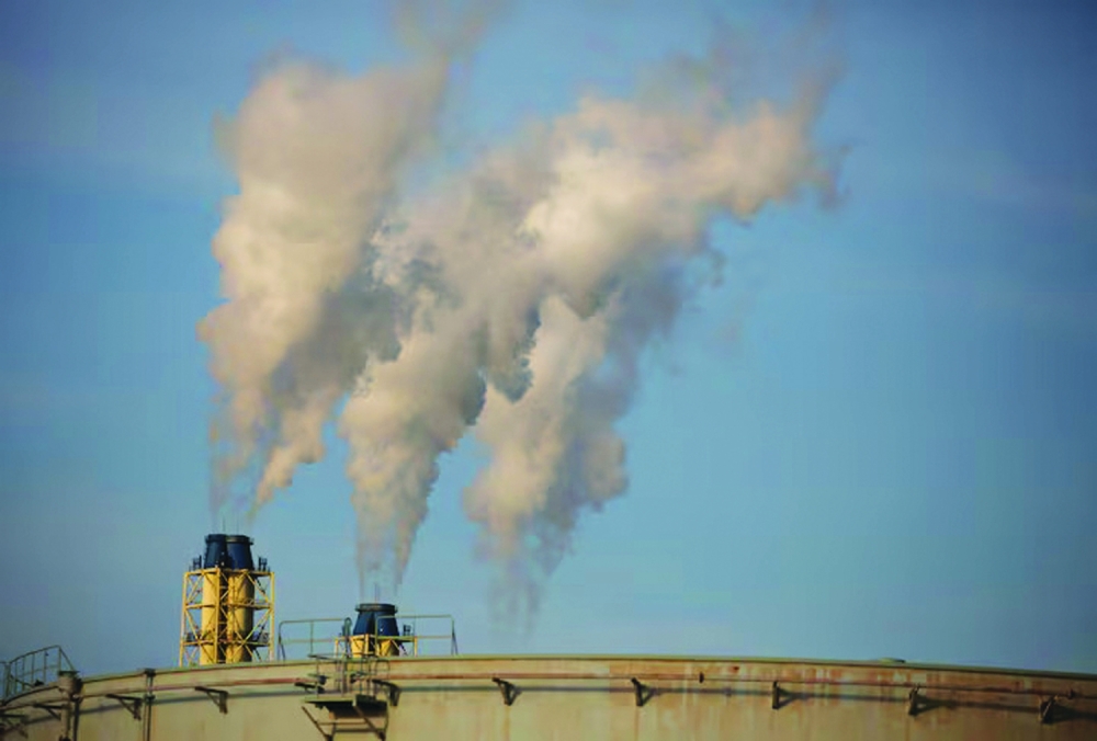 Steam is emitted from a oil refinery in Sodegaura, Japan. — Reuters