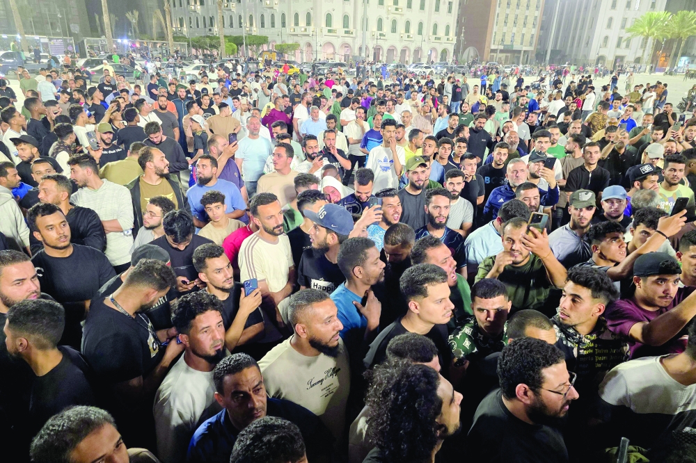 Libyan protesters gather in Tripoli's Martyrs Square to call for the resignation of the national unity government. — AFP
