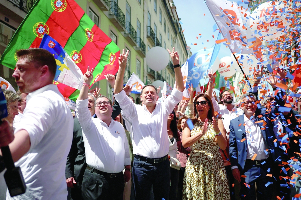 Luis Montenegro, PM and Social Democratic Party (PSD) leader, gestures during an AD coalition rally, in Lisbon. — Reuters