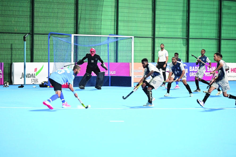 Al Amerat make an attack at Salalah goalmouth.