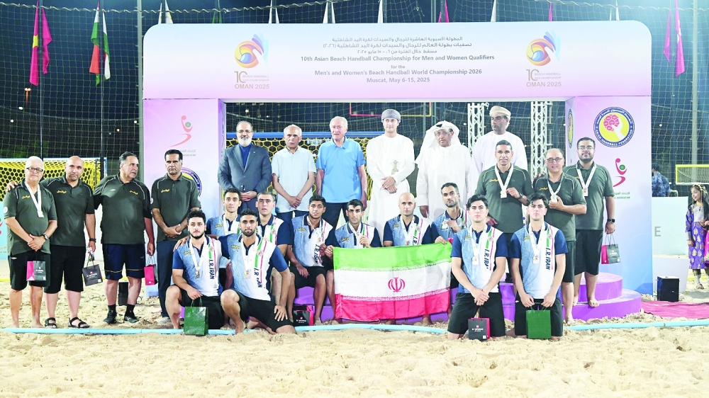 Iran players with runners-up medals.