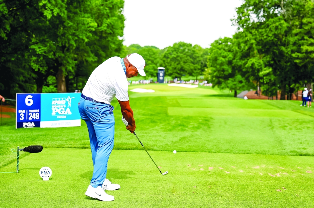 Jhonattan Vegas hits his tee shot on the sixth hole during the second round of the PGA Championship golf tournament at Quail Hollow. — Reuters 