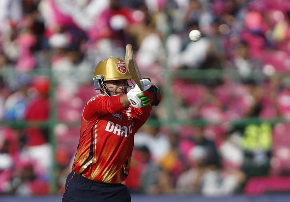 Punjab Kings' Azmatullah Omarzai in action. — Reuters