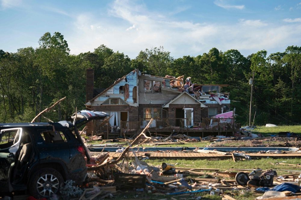A damaged house is seen