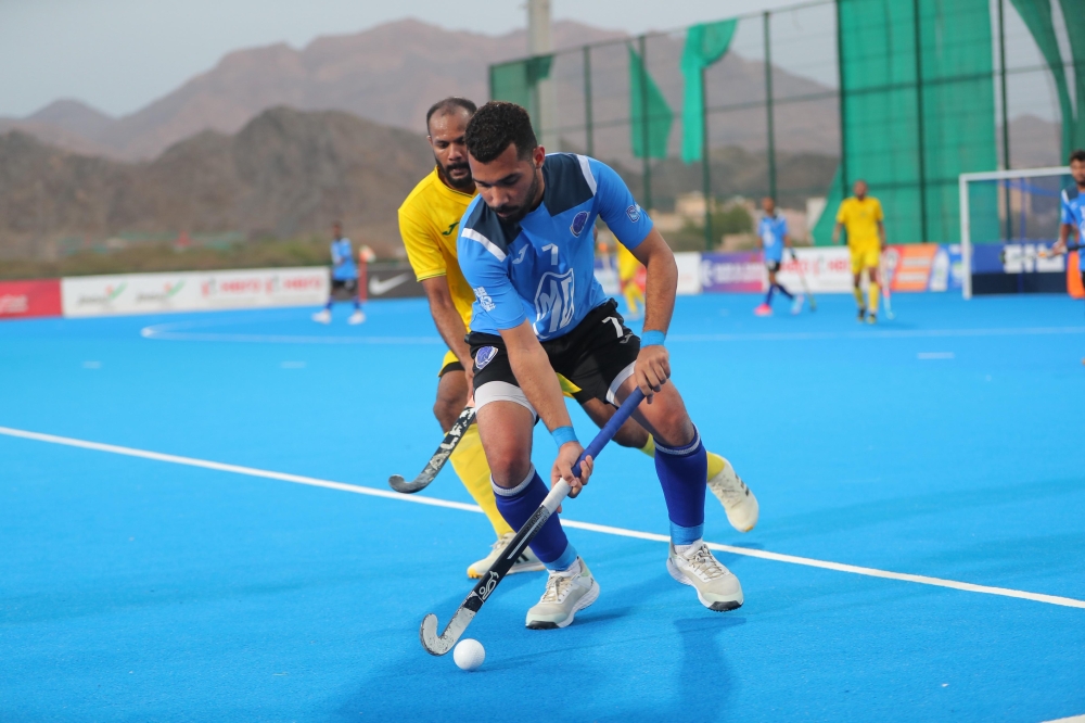 Seeb and Al Amerat players in action.
