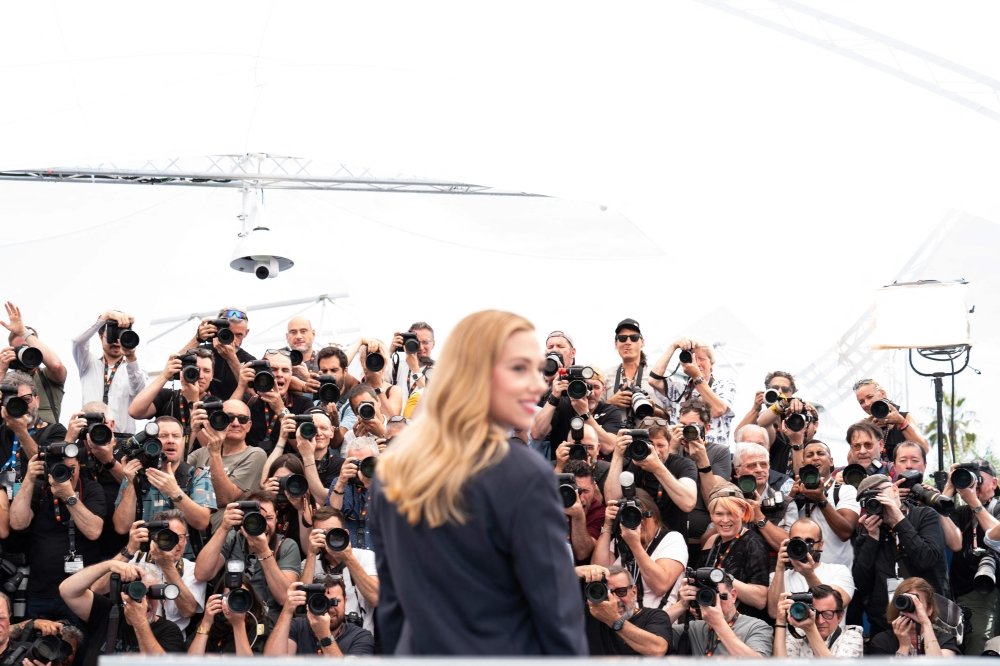 US director Scarlett Johansson poses during a photocall for the film "Eleanor the Great" at the 78th edition of the Cannes Film Festival in Cannes, southern France, on May 21, 2025. (Photo by Valery HACHE / AFP)


