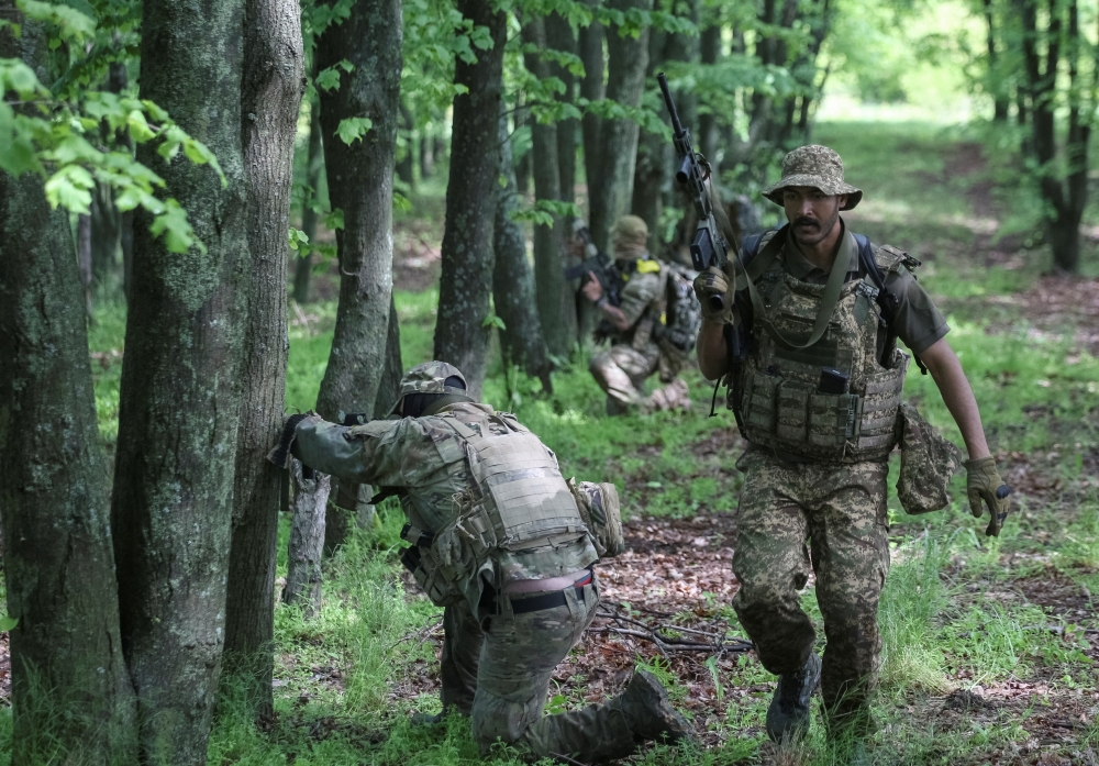 Foreign service members of the National Guard of Ukraine attend an exercise, in Kharkiv region. — Reuters