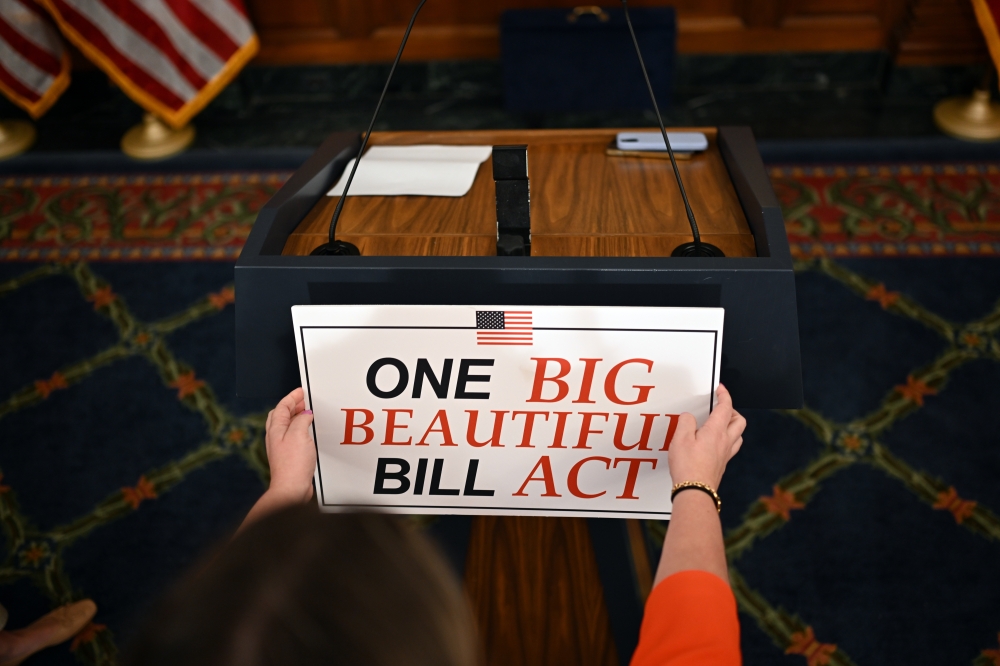 The lectern is prepared for a news conference at the Capitol in Washington on Thursday morning, May 22, 2025, after the House narrowly passed a wide-ranging bill to deliver President Donald Trumps domestic agenda.  (Kenny Holston/The New York Times)