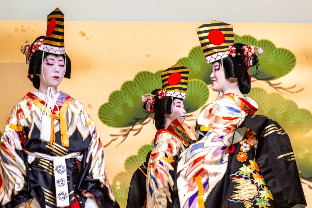 This picture taken on May 20, 2025 shows Shinbashi geishas rehearsing at the Shinbashi Enbujo Theatre before the 100th Azuma Odori festival in Tokyo. Geishas are a rare sight in modern Japan, but some of the few still working in Tokyo glide with measured steps across a wooden stage, offering a glimpse of a long-misunderstood tradition. - TO GO WITH Japan-culture-tradition-dance-geisha,REPORTAGE by Caroline GARDIN
 (Photo by Philip FONG / AFP) / TO GO WITH Japan-culture-tradition-dance-geisha,REPORTAGE by Caroline GARDIN

