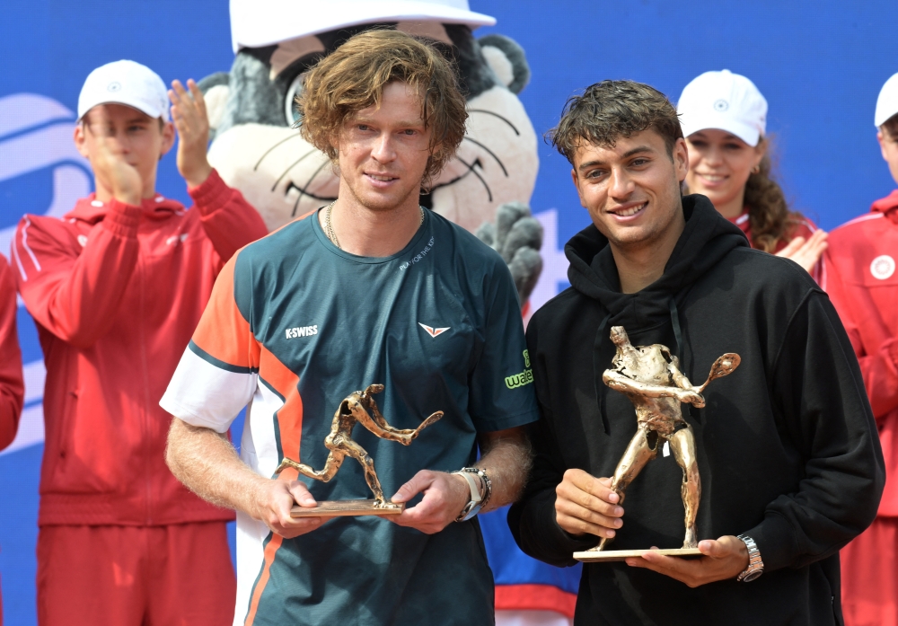 Hamburg European Open winner Italy's Flavio Cobolli and runner up Russia's Andrey Rublev pose with their trophies. — Reuters