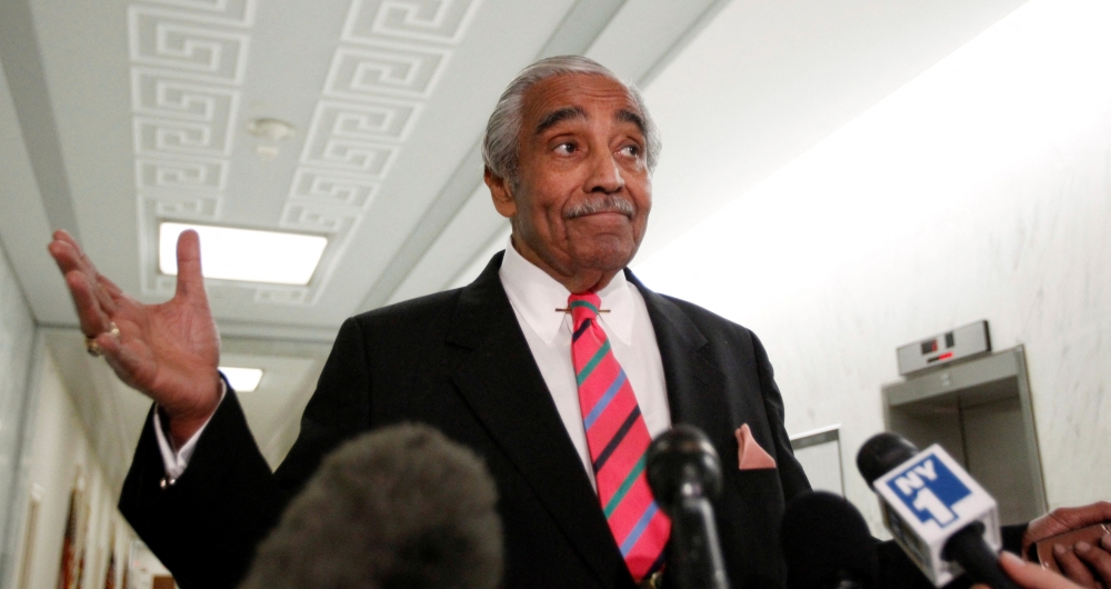 FILE PHOTO: U.S. Representative Charlie Rangel (D-NY) gestures as he speaks to the members of the media in front of his House office on Capitol Hill in Washington, November 16, 2010. REUTERS/Hyungwon Kang/File Photo