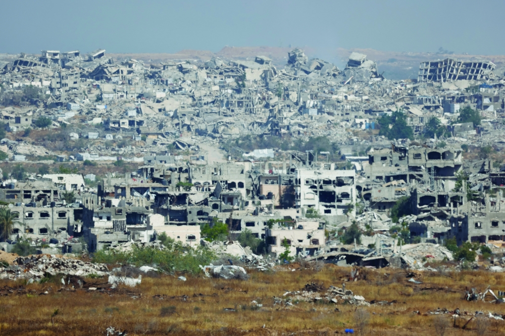 A view of destroyed buildings in Gaza, near the Israel-Gaza border, as seen from Israel, on Monday. — Reuters