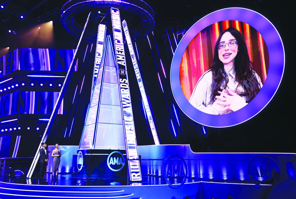 Billie Eilish gives acceptance speech for the Artist of the Year award virtually at the 2025 American Music Awards, in Las Vegas, Nevada, U.S., May 26, 2025. REUTERS/Mario Anzuoni