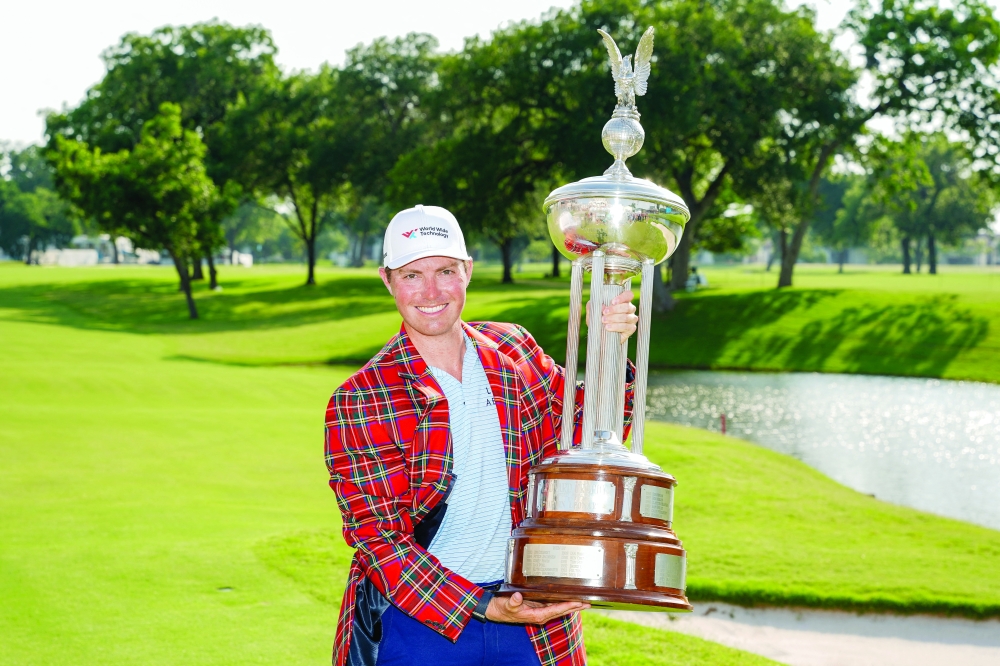  Ben Griffin poses with the trophy. — Reuters 