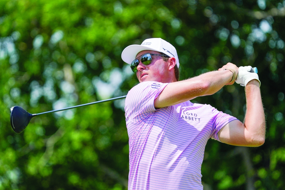  Ben Griffin plays his shot from the 12th tee. — Reuters 