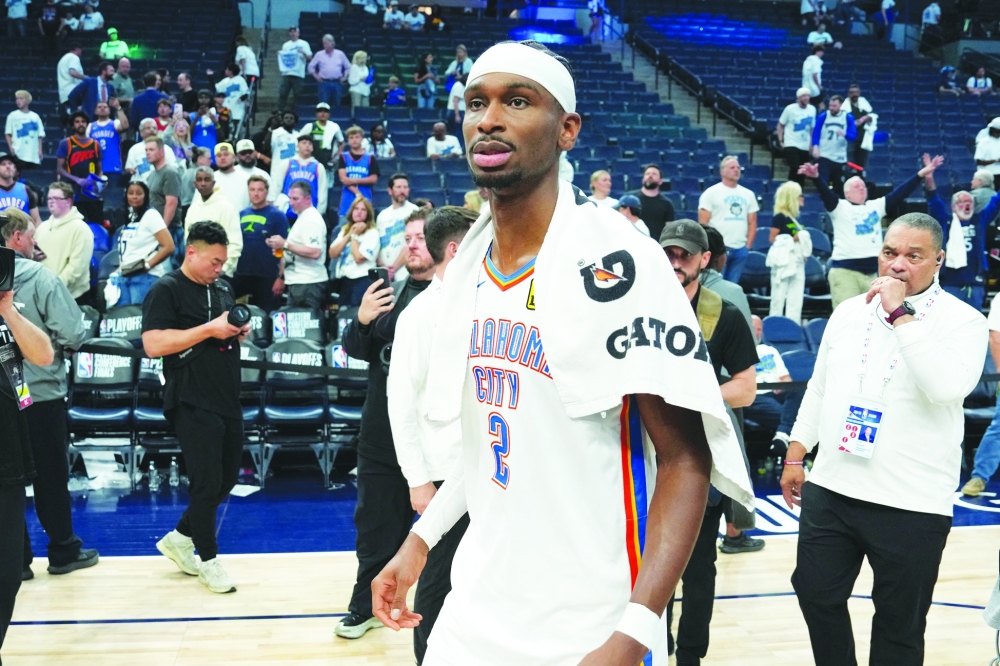 Shai (2) reacts after defeating the Minnesota. — Reuters
