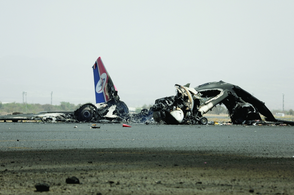 A view of a destroyed plane at Sanaa International Airport in the aftermath of an Israeli air strike. — Reuters file photo