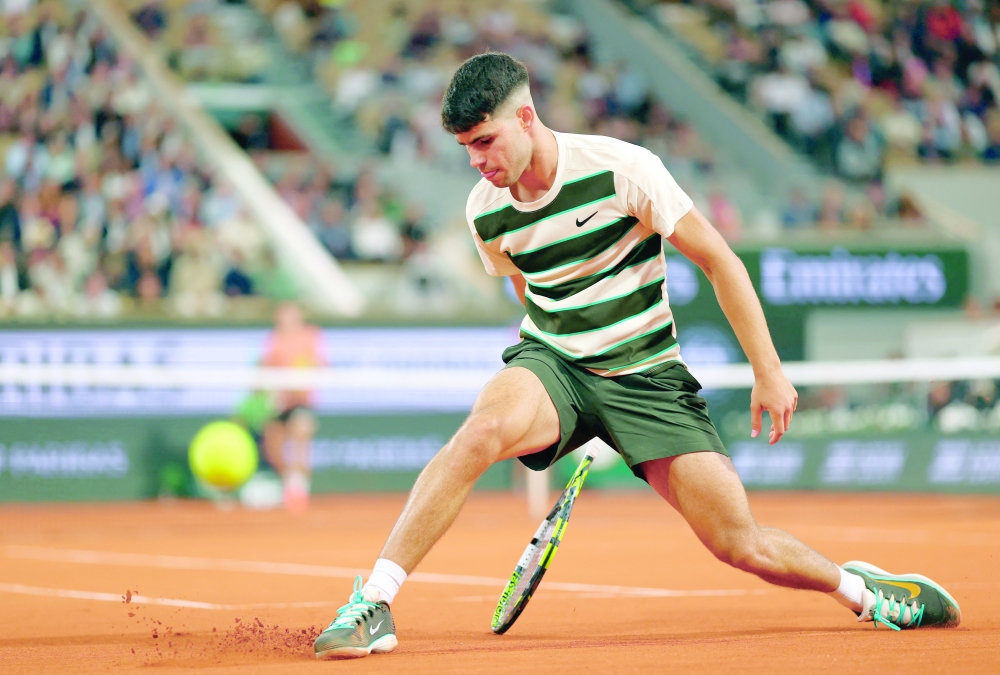 Alcaraz in action during his second round match. — Reuters