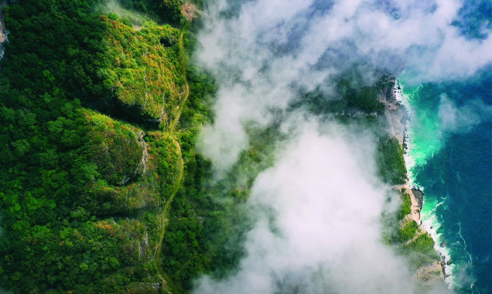 The monsoon in Oman is influenced by different atmospheric and oceanic factors compared to India’s southwest monsoon.