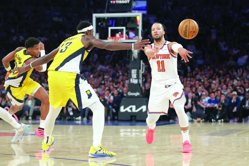 Jalen (11) passes against Siakam (43) in the fourth quarter. — Reuters
