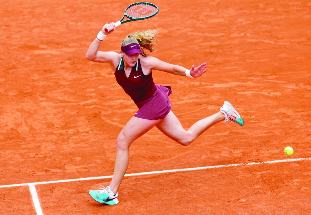 Russia's Mirra Andreeva in action during her third round match against Kazakhstan's Yulia Putintseva REUTERS