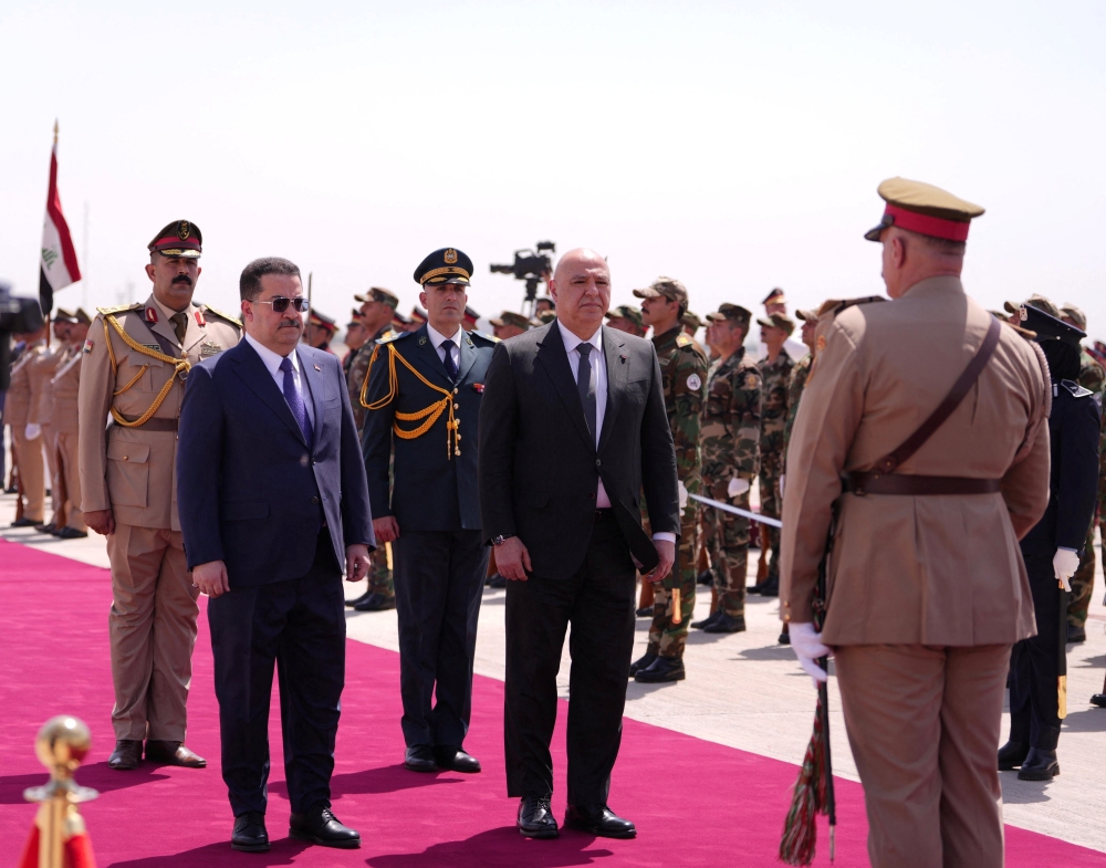 Iraqi Prime Minister Mohammed al-Sudani welcomes Lebanese President Joseph Aoun in Baghdad. — Reuters
