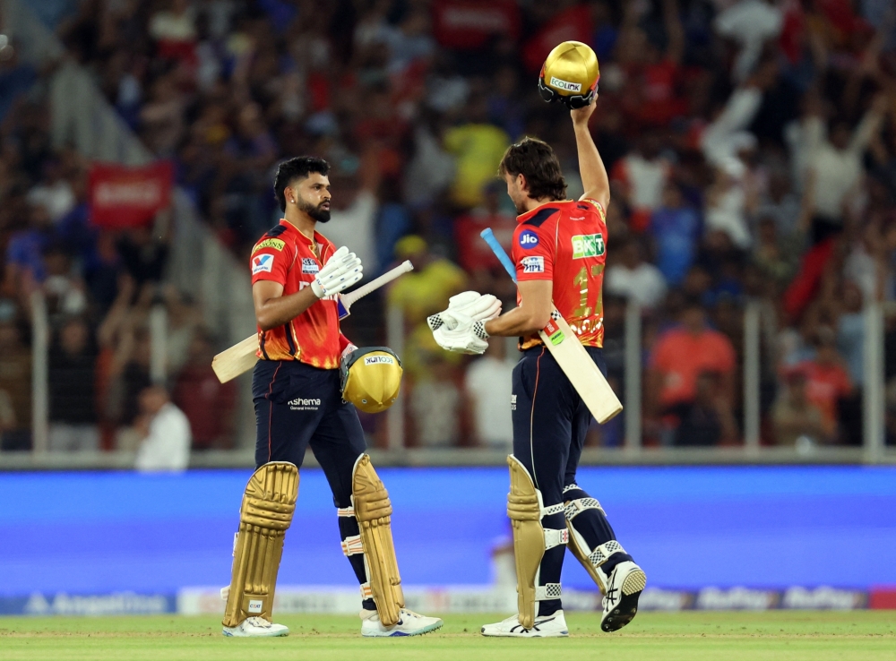 Punjab Kings' Shreyas Iyer and Marcus Stoinis celebrate after winning the match. — Reuters