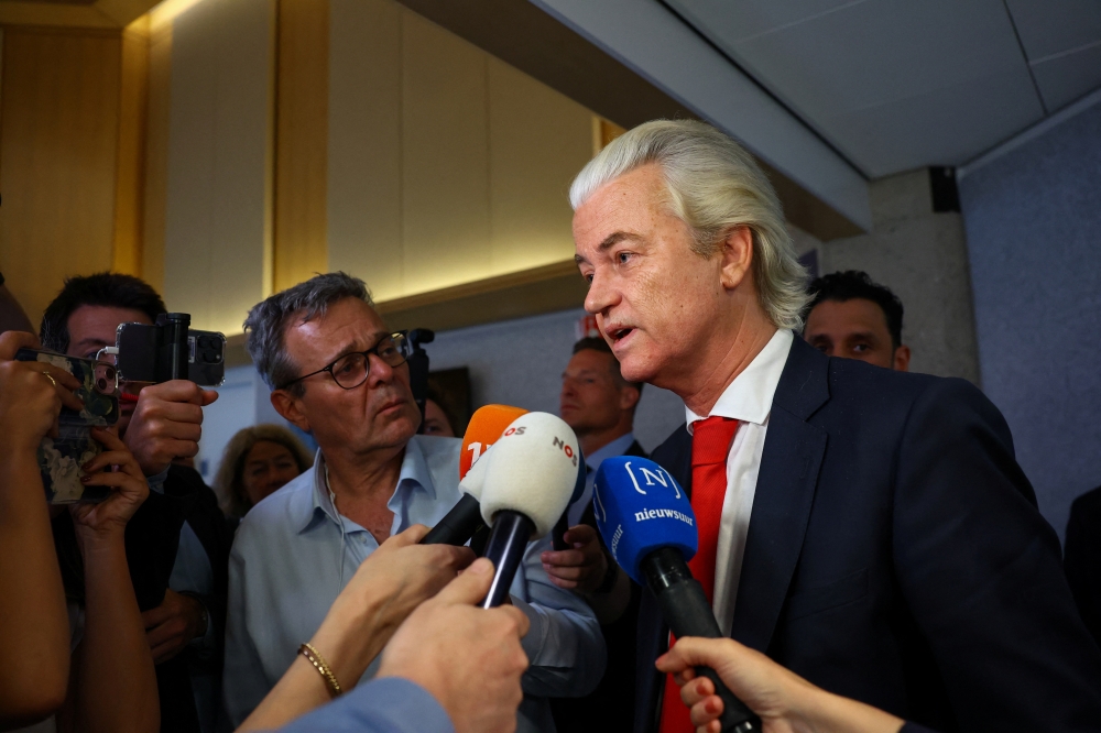 Dutch far-right leader Geert Wilders speaks to the media, in The Hague. — Reuters