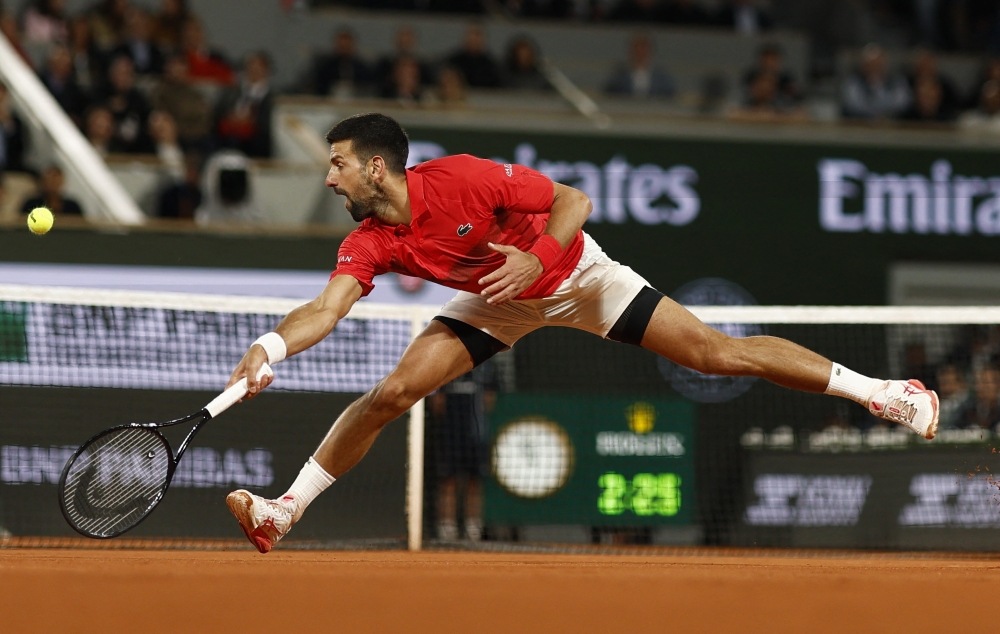 Tennis - French Open - Roland Garros, Paris, France - June 4, 2025 Serbia's Novak Djokovic in action during his quarter final match against Germany's Alexander Zverev REUTERS/Stephanie Lecocq
