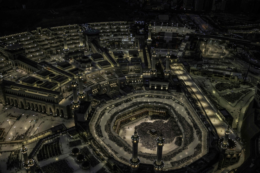 This aerial view shows the Grand Mosque complex and its surroundings in Mecca. — AFP