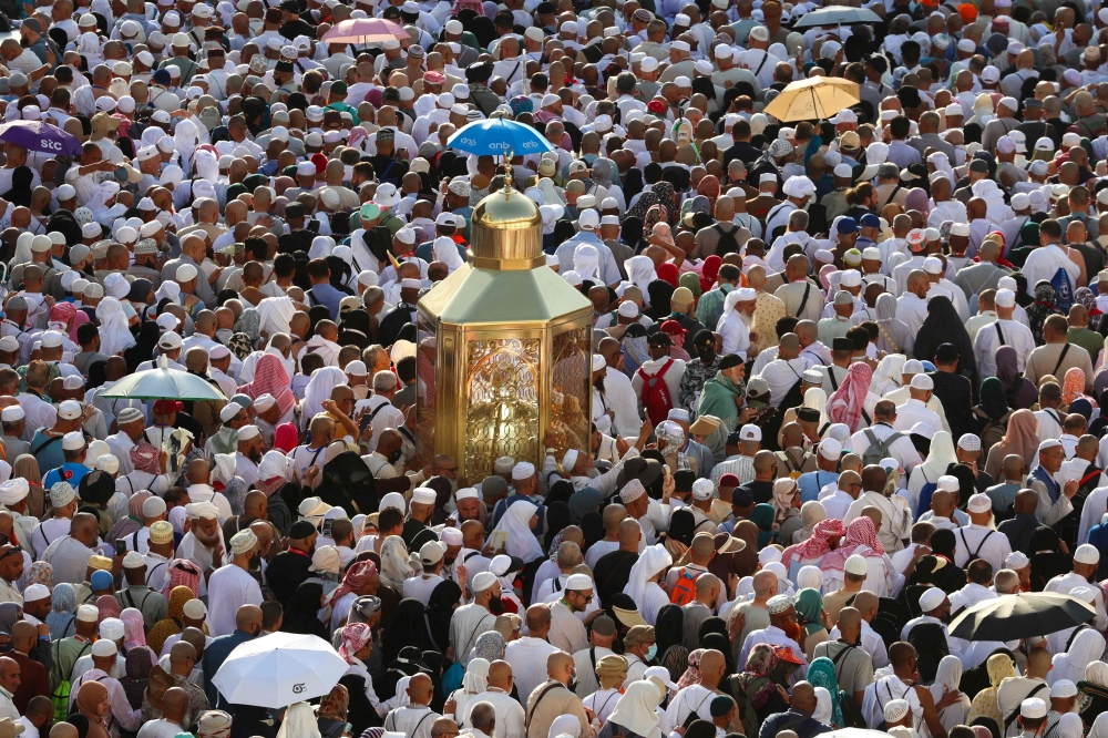 Muslim worshippers make their way towards the Kaaba. — AFP