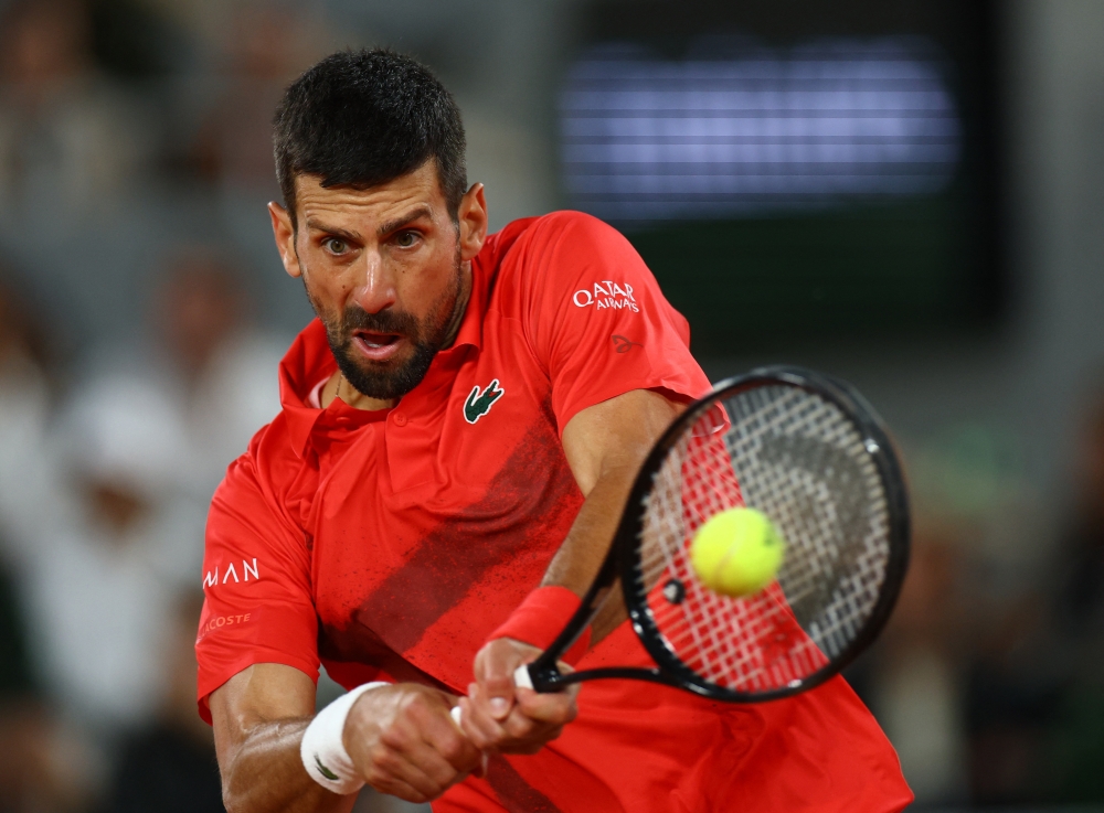Djokovic in action during his semifinal match against Jannik Sinner.  — Reuters 