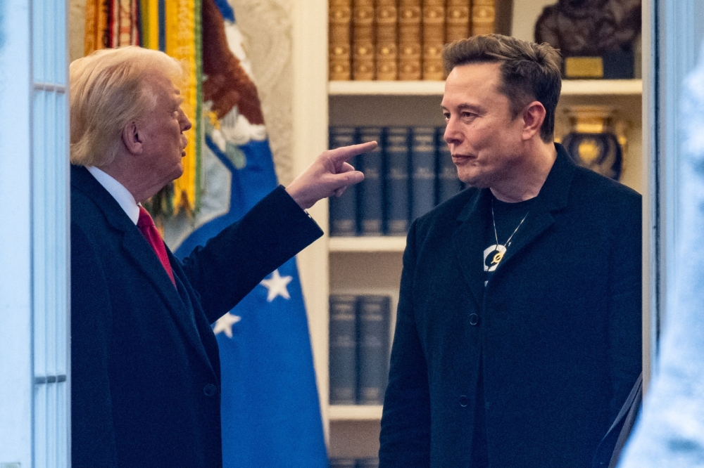 US President Donald Trump and Elon Musk (R) speak in the Oval Office in Washington, DC. AFP file photo