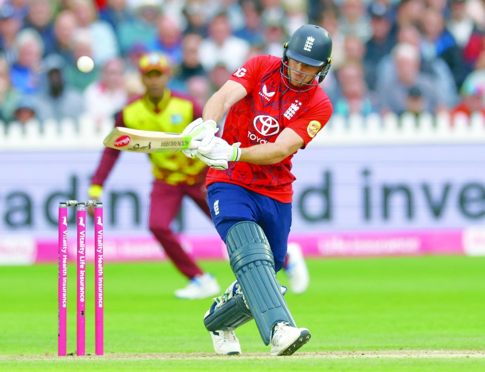 England's Jos Buttler in action Action. — Reuters