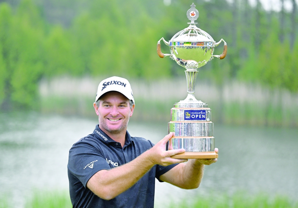Ryan Fox holds the winner's trophy. — Reuters