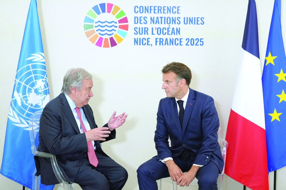 UN Secretary General Antonio Guterres (L) meets France's President Emmanuel Macron on the sideline of the third UN Ocean Conference, in Nice. — Reuters