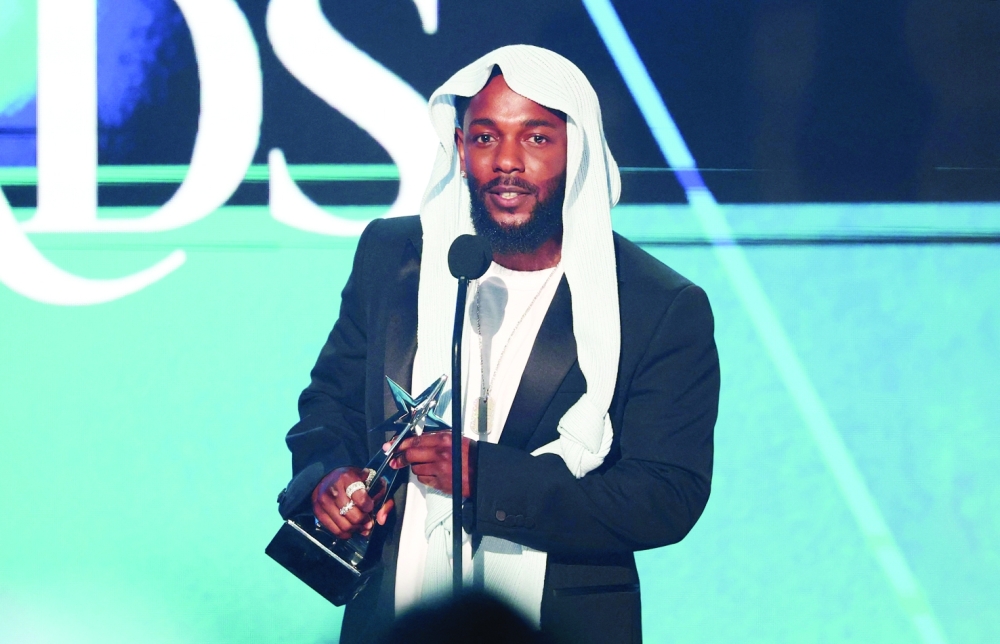 Winner of Album of the Year with "GNX" US rapper songwriter Kendrick Lamar speaks on stage during the 2025 BET Awards at the Peacock Theatre in Los Angeles on June 9, 2025. 